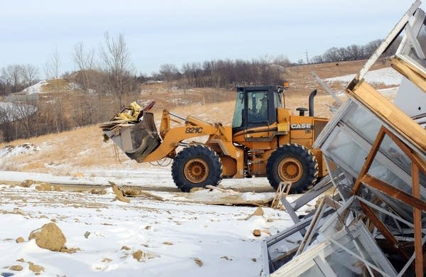 Truck hauling demolition debris at landfill