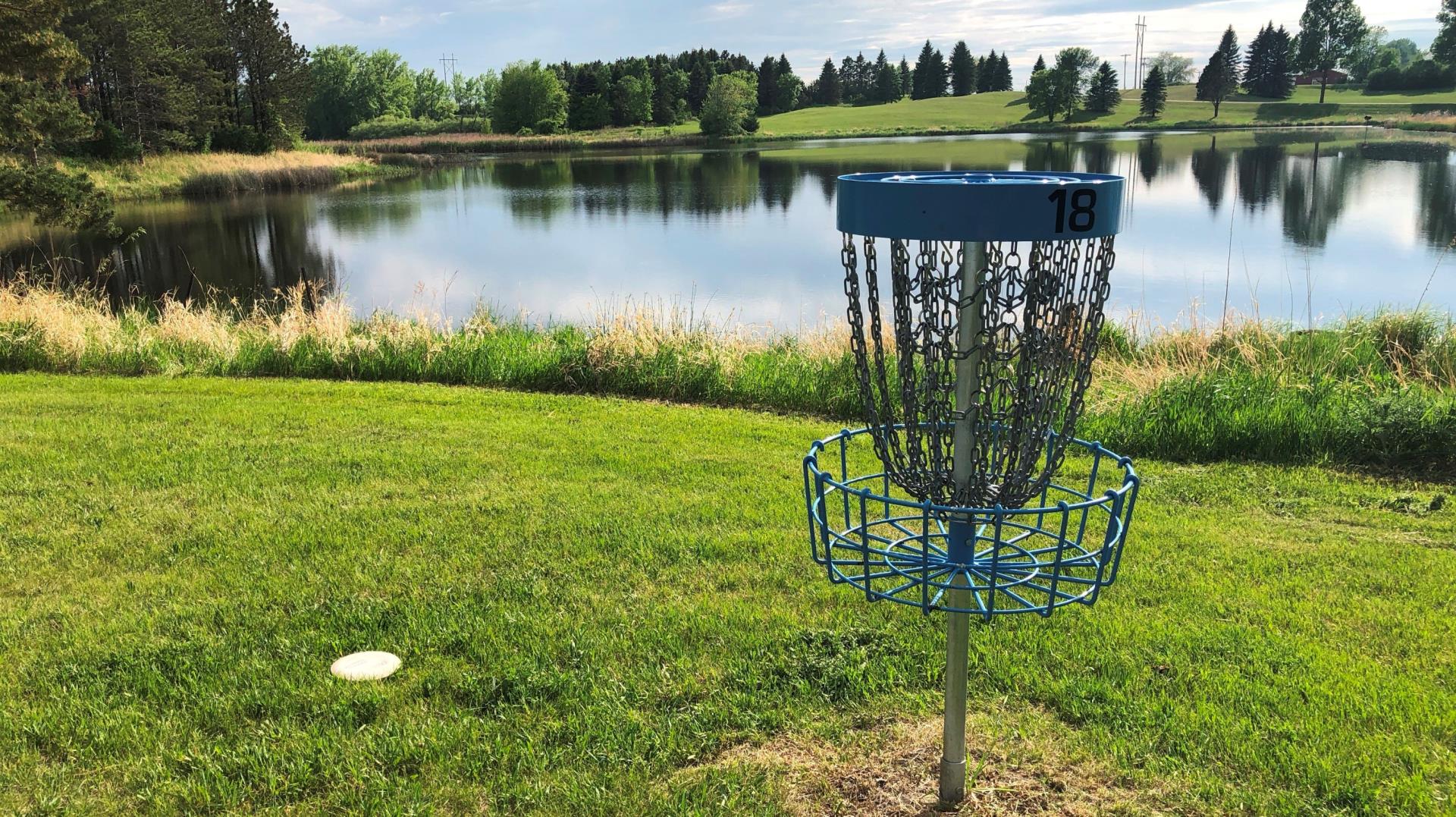 Disc Golf Basket with pretty scenery in the background